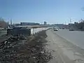 Вид на будущую развязку Кашириных-Российская-Труда-Свободы, справа дорога по временному металлическому мосту