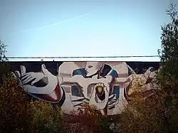 Мозаичное панно на фасаде библиотечного корпуса 2-го Медицинского института (2-го МОЛГМИ) «Исцеление человека»